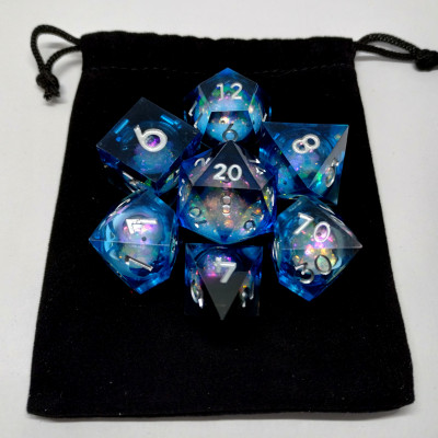 Liquid Core Maelstrom of Dreams dice kit - black and blue in a bottle with screw-cap