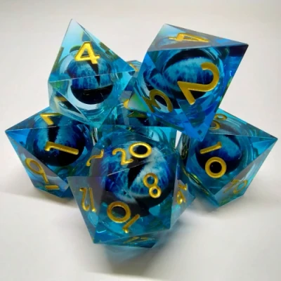 Liquid Core Dragon Eye dice kit - blue in a bottle with screw-cap