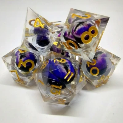 Liquid Core Dragon Eye dice kit - translucent with purple dragon eye in a bottle with screw-cap