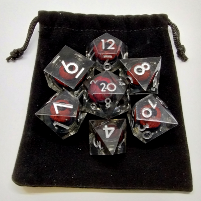 Liquid Core Demon Eye dice kit - black with red eye in a bottle with screw-cap