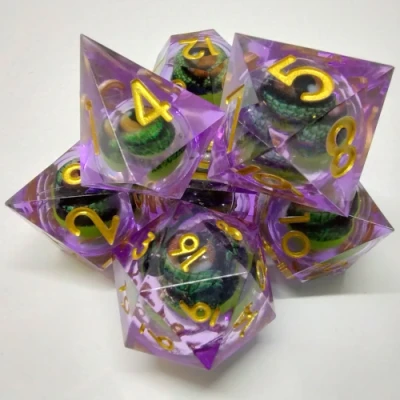 Liquid Core Dragon Eye dice kit - purple with green eyeball in a bottle with screw-cap