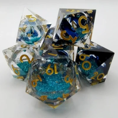 Mystic Effervescence - black-stained translucence with gold foil, blue sparkles, and gold numbers in a bottle with screw-cap
