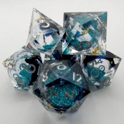 Mystic Effervescence - black-stained translucence with gold foil, blue sparkles, and silver numbers in a bottle with screw-cap